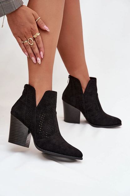 Premium quality women's eco suede ankle boots by Step in Style, featuring decorative cut-outs, a chic design, and a statement column heel for luxury footwear.