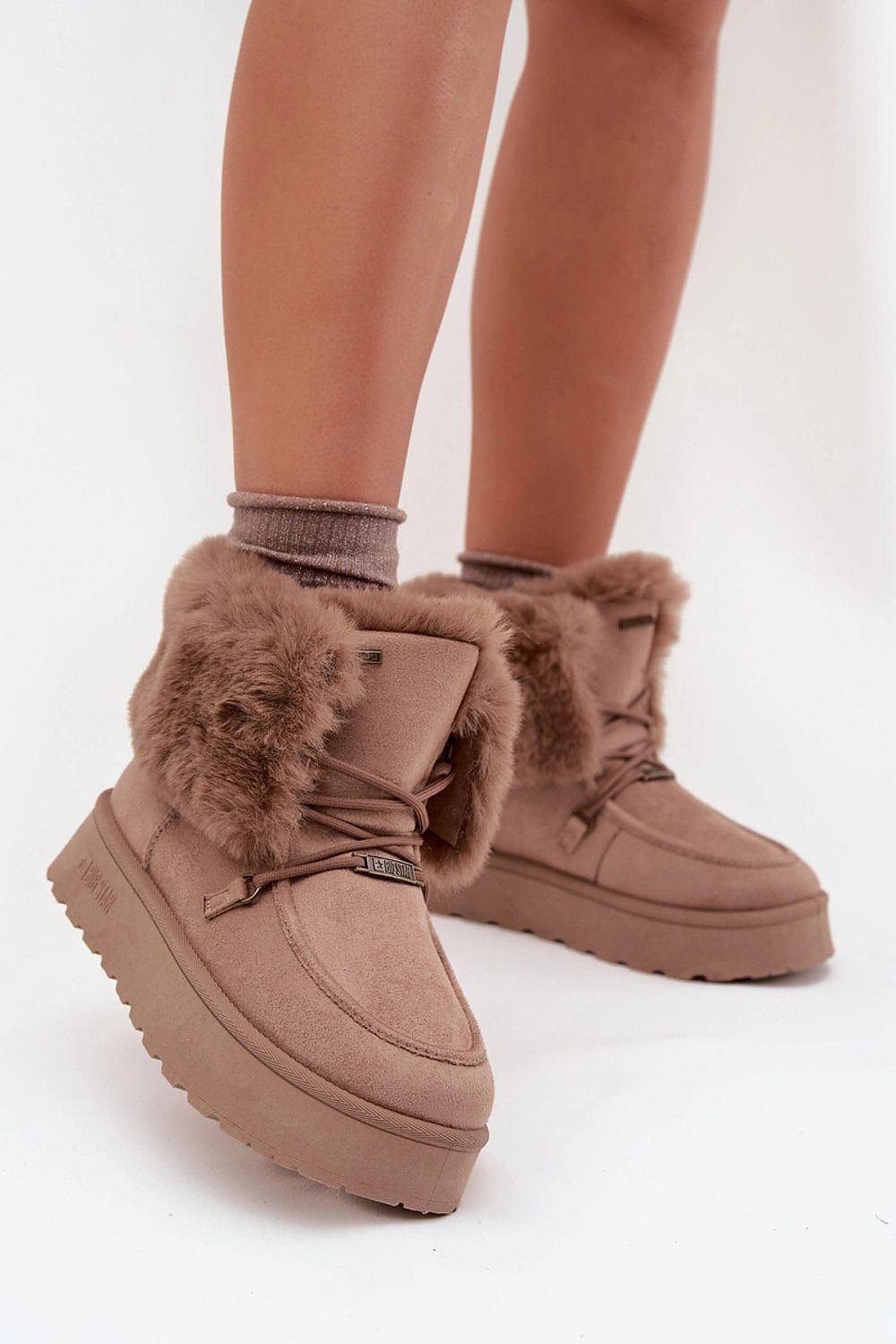 Premium women's snow boots from Step in Style, designed with eco-friendly suede and a soft fur interior, ideal for maintaining warmth and style in cold weather.