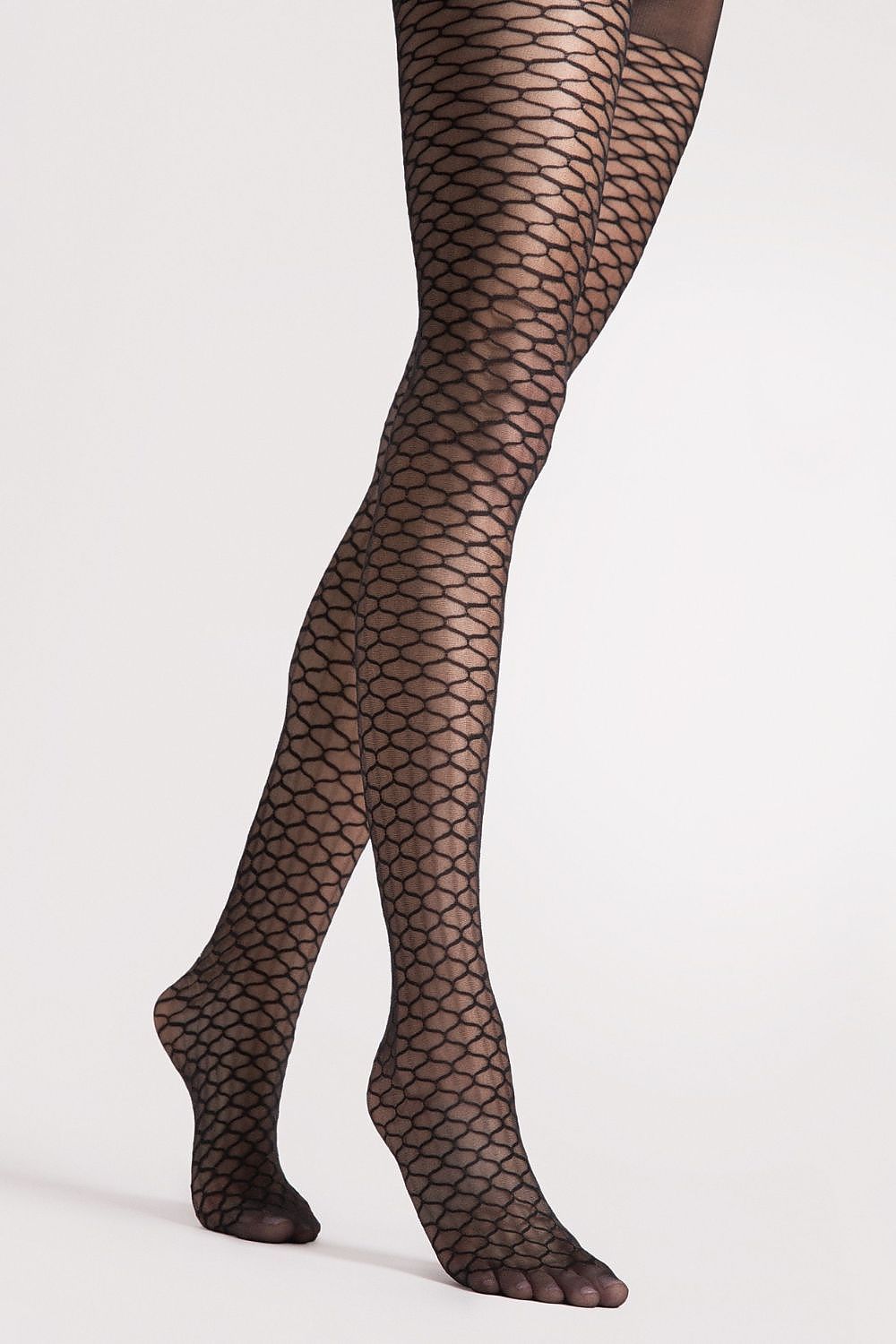 Fiore elegant Darla tights featuring a striking geometric pattern, perfect for adding sophistication to your style, available in multiple sizes from EU 2-S to EU 4-L.