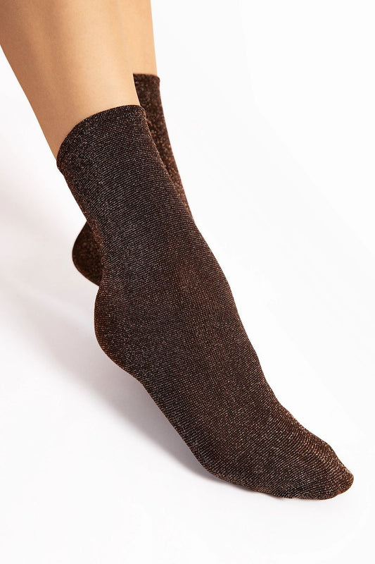 Elegant Fiore socks showcasing sophisticated 3D weaving technology, perfect fit, and a stylish sheen for luxurious comfort.