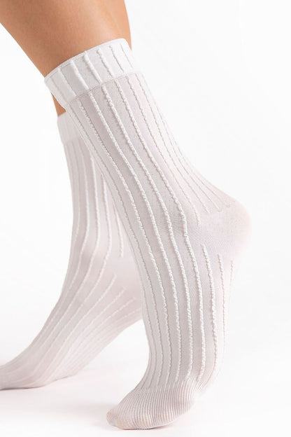 Close-up view of Fiore Basico Socks showcasing the minimalist ribbed texture, ideal for both casual and elegant ensembles.