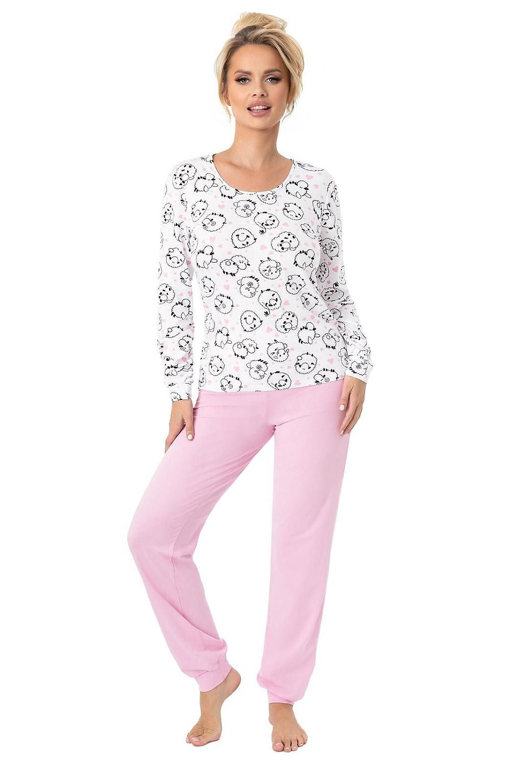 Elegant luxury women's cotton pyjamas by Donna featuring a charming sheep design, showcasing comfort and style, perfect for relaxation at home.