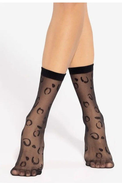 Gatta Women’s Elegant Semi-Matte High Socks with subtle pattern, showcasing a luxurious 20 DEN thickness, perfect for adding elegance to any outfit.