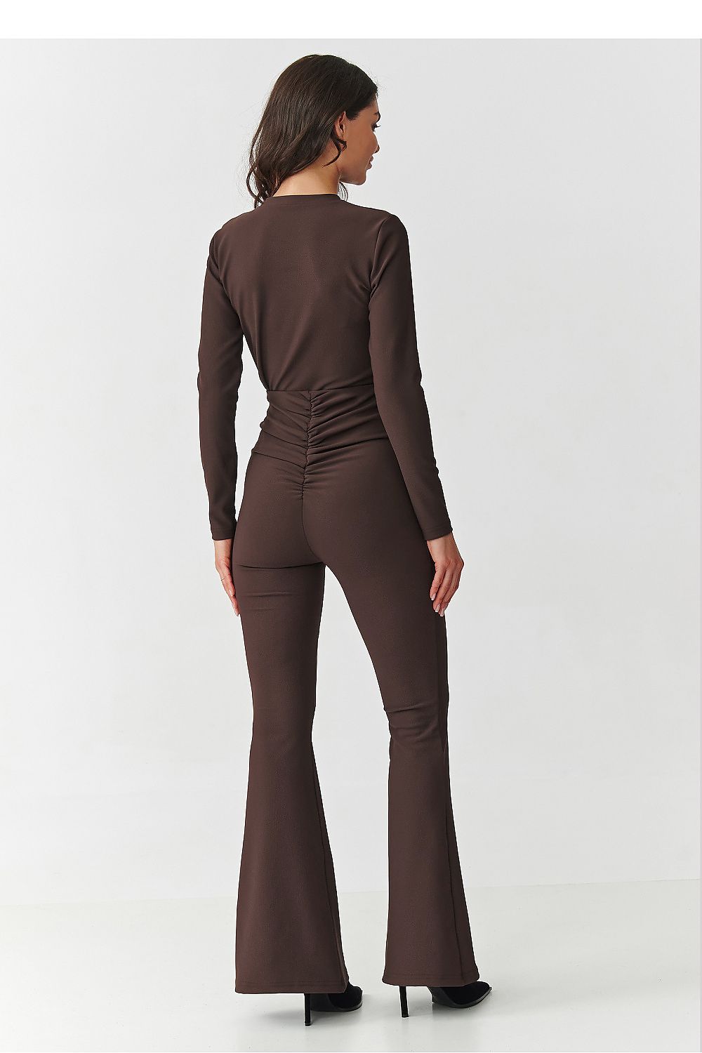 Makadamia Women's Elegant Set showcasing the chic black fitted blouse and stylish high-waisted flared pants ideal for sophisticated occasions.