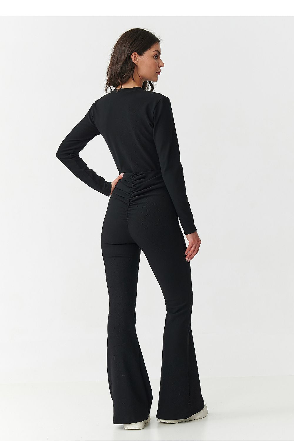 Beige elegant women's set by Makadamia, consisting of a fitted blouse and flattering high-waisted flared pants, perfect for versatile styling.