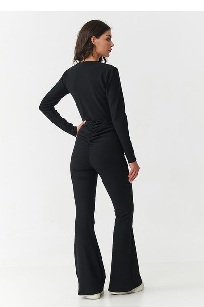 Beige elegant women's set by Makadamia, consisting of a fitted blouse and flattering high-waisted flared pants, perfect for versatile styling.