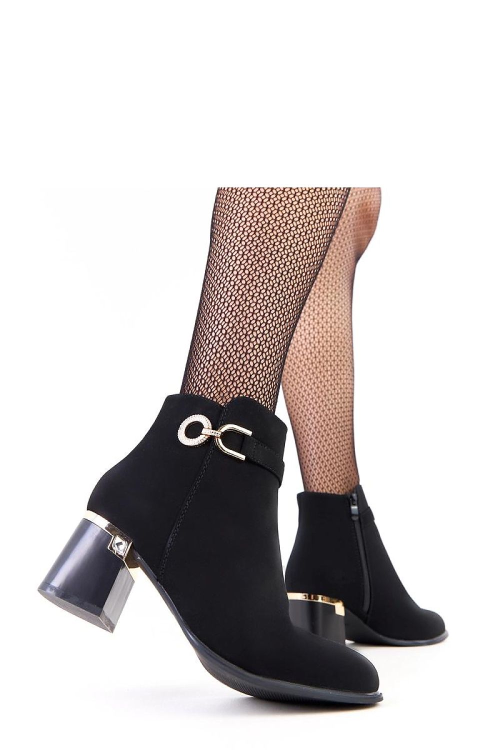 Side view of Solea's chic women's ankle boots with a stable 6.5 cm column heel and almond toe design.