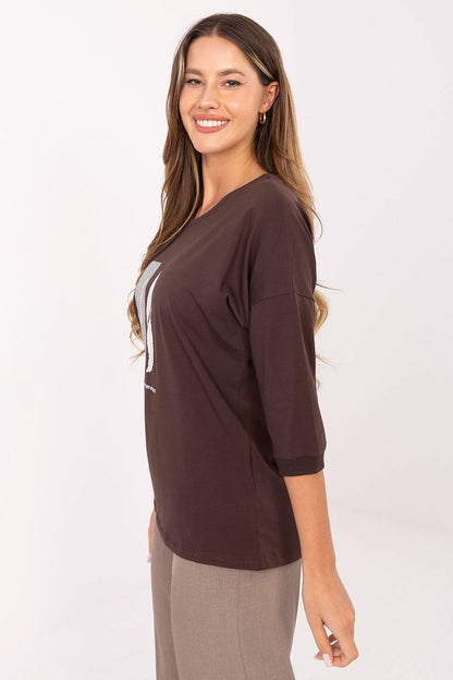 Relevance women's blouse in EU size 0, showcasing its flattering 3/4 sleeves and round neckline, perfect for both casual and semi-formal occasions.