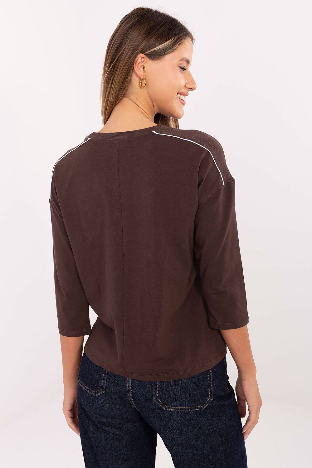 Elegant casual women's blouse by Relevance in soft cotton with embroidered accents, perfect for stylish everyday wear.