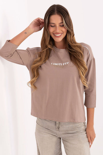 Chic embroidered women's blouse from Relevance, made from 90% cotton and 10% spandex, ideal for comfort and style.