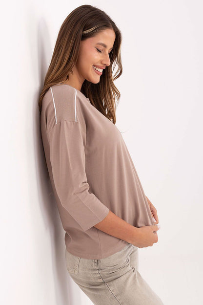 Elegant casual blouse for women by Relevance, perfect for pairing with skirts or trousers, highlighting luxury in everyday wear.