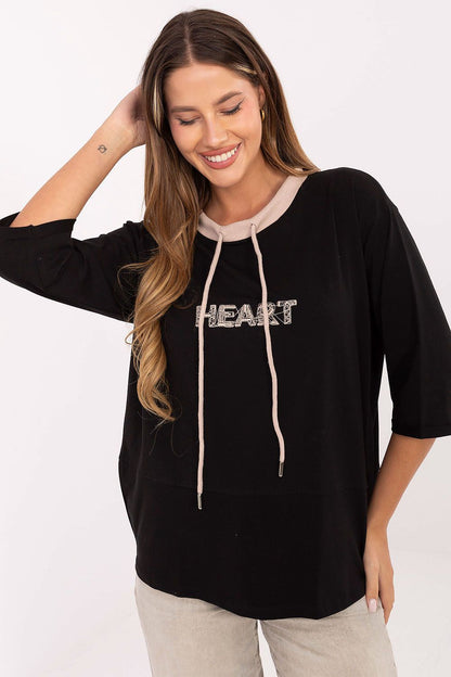 Chic embroidered cotton blouse from Relevance, combining 3\/4 sleeves with modern details for a fashionable everyday look.