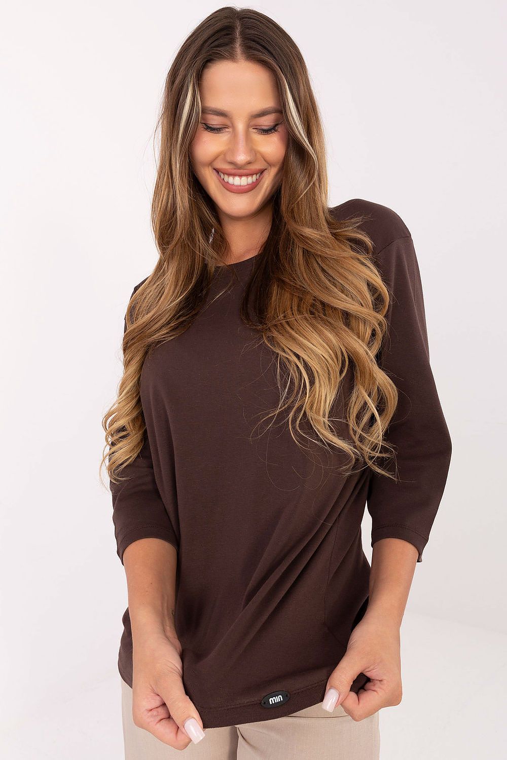 Front view of Relevance elegant casual women's blouse, showcasing smooth patterns and sophisticated styling for versatile casual wear.