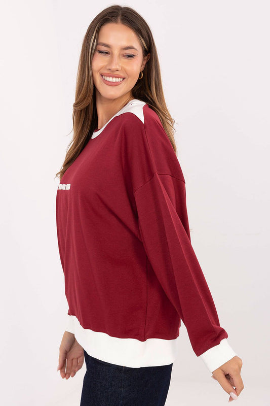 Luxury casual women's sweatshirt with embroidered logo by Relevance, showcasing soft cotton blend fabric in elegant style.