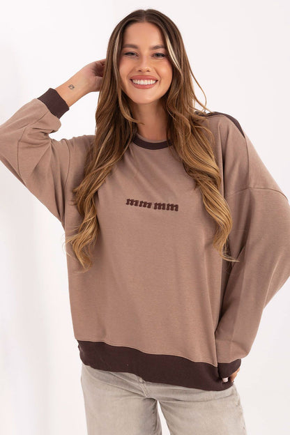 Luxury casual women's sweatshirt by Relevance, featuring an elegant embroidered logo on a soft cotton blend fabric.