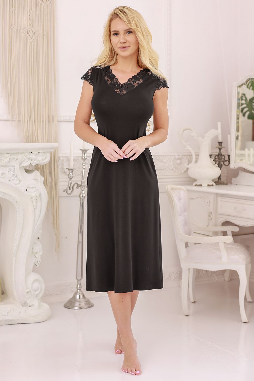 Close-up of the Kalimo Langu Nightshirt's floral lace neckline, highlighting the exquisite craftsmanship and soft viscose material.