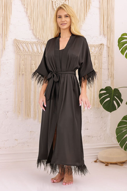 Kalimo Diva Luxury Bathrobe in silk-like satin featuring elegant feather accents, perfect for luxurious lounging.