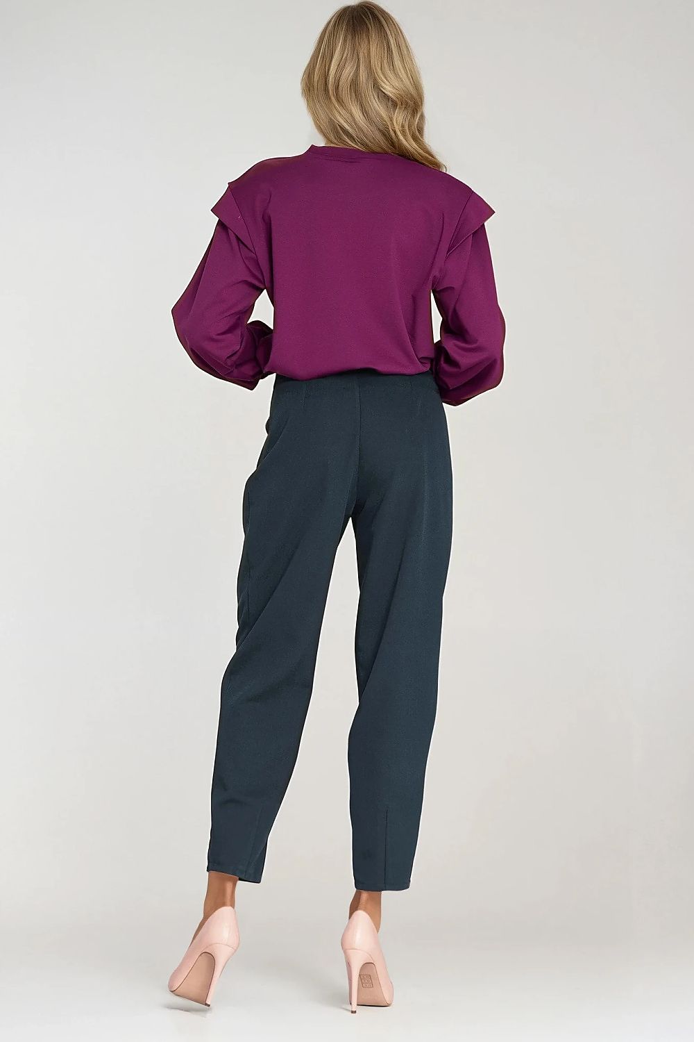 Luxury women's high-waisted oversized balloon trousers with pockets by Nife, featuring a fashionable tapered balloon style and practical belt loops.