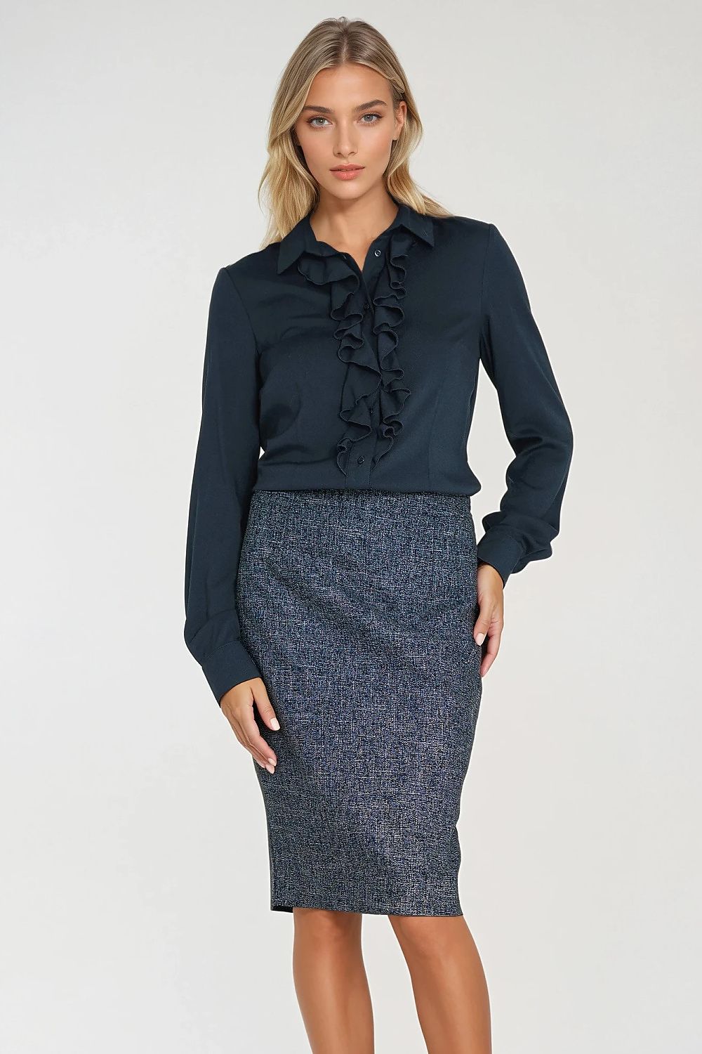 Model wearing Nife's elegant women's long sleeve fitted shirt, styled to emphasise sophisticated femininity.