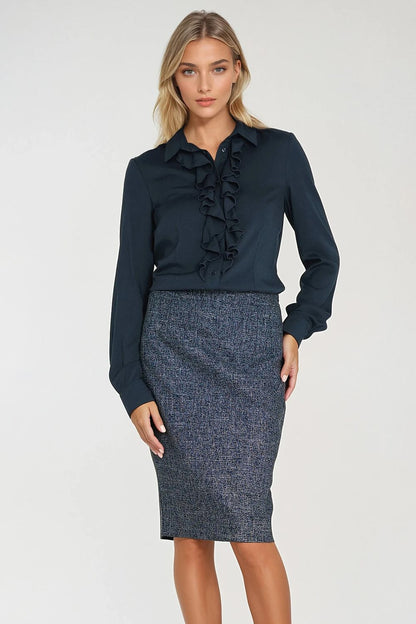 Model wearing Nife's elegant women's long sleeve fitted shirt, styled to emphasise sophisticated femininity.