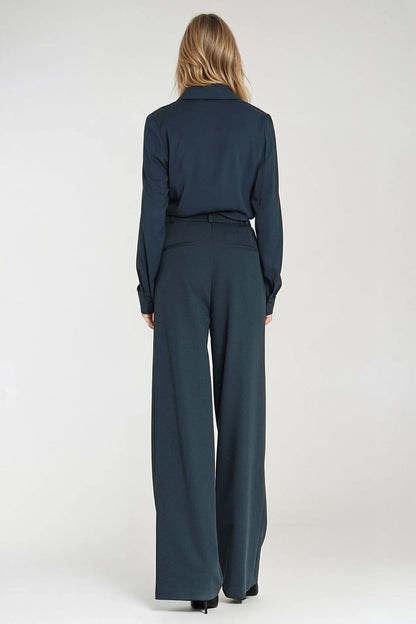 Stylish Nife women's fitted shirt displayed against a classic backdrop, highlighting its timeless elegance and flattering silhouette.