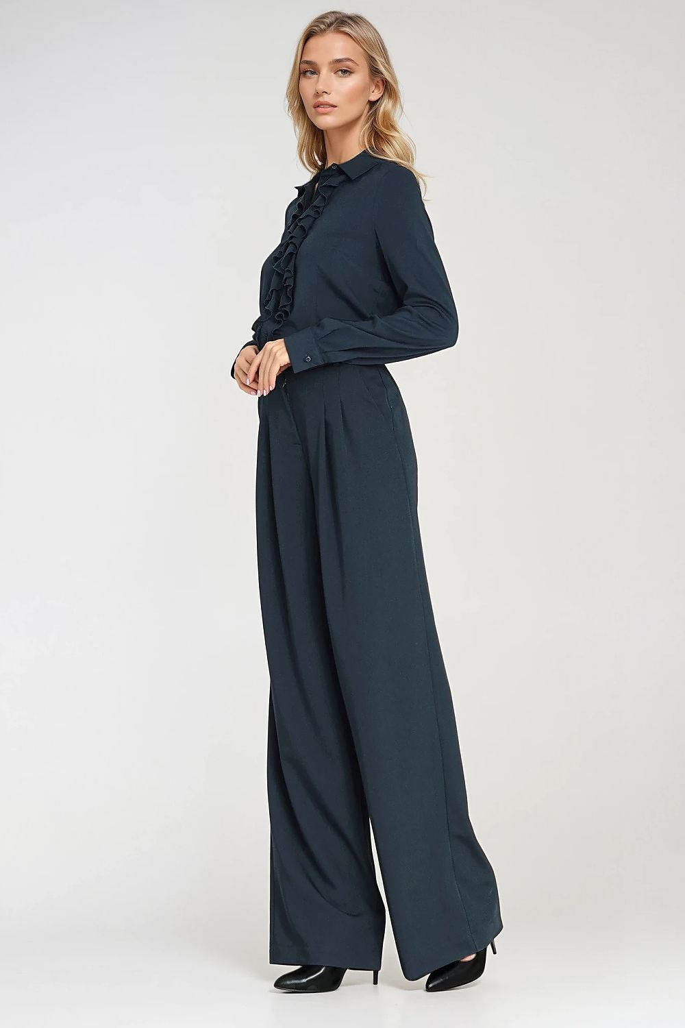 Flat lay image of Nife's women's long sleeve fitted shirt, showcasing its soft cotton and polyester blend with refined jabot design.