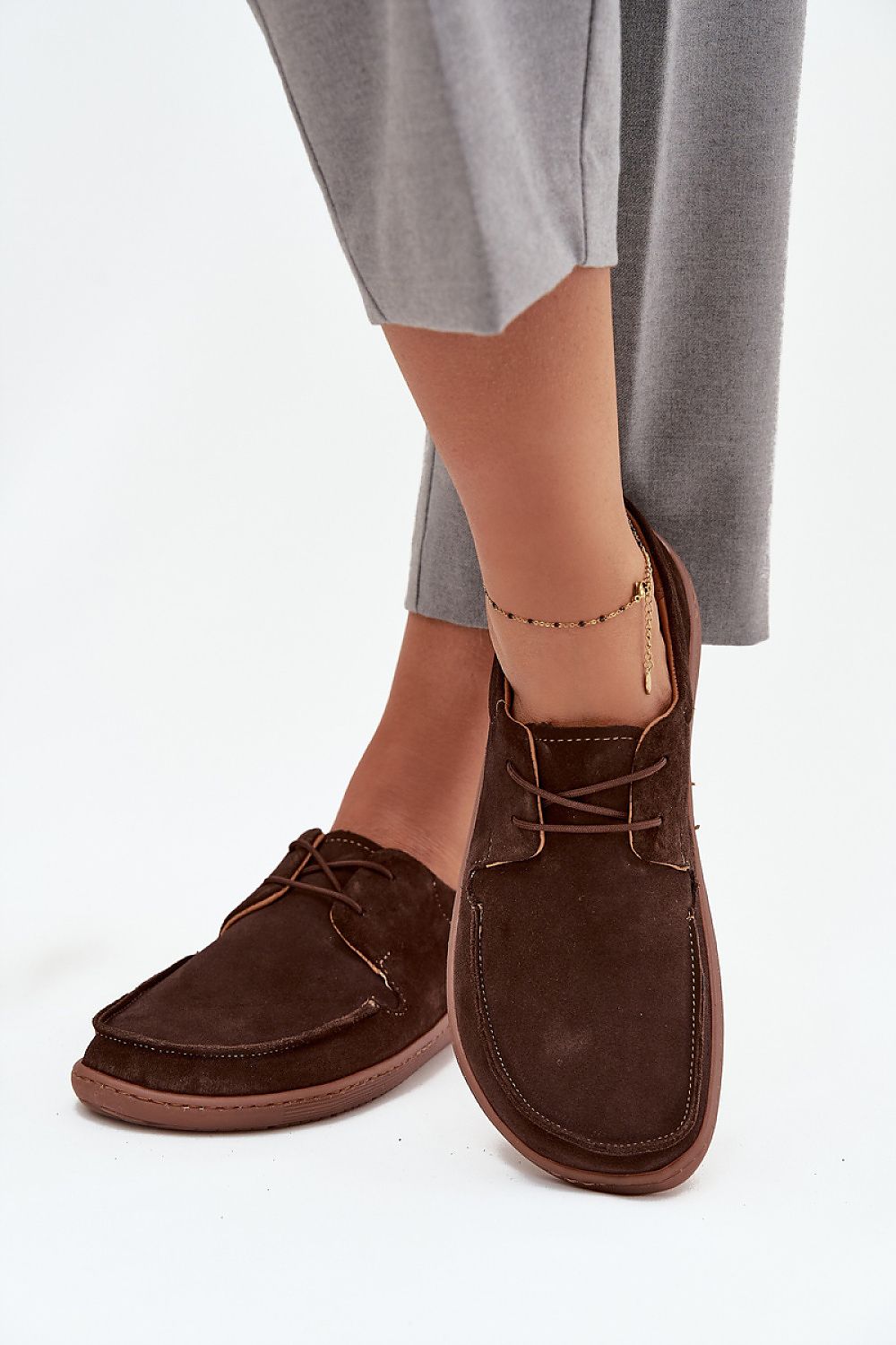 Close-up view of the exquisite decorative stitching on Step in style women's natural suede half shoes, showcasing comfort and a stylish design ideal for casual and elegant outfits.