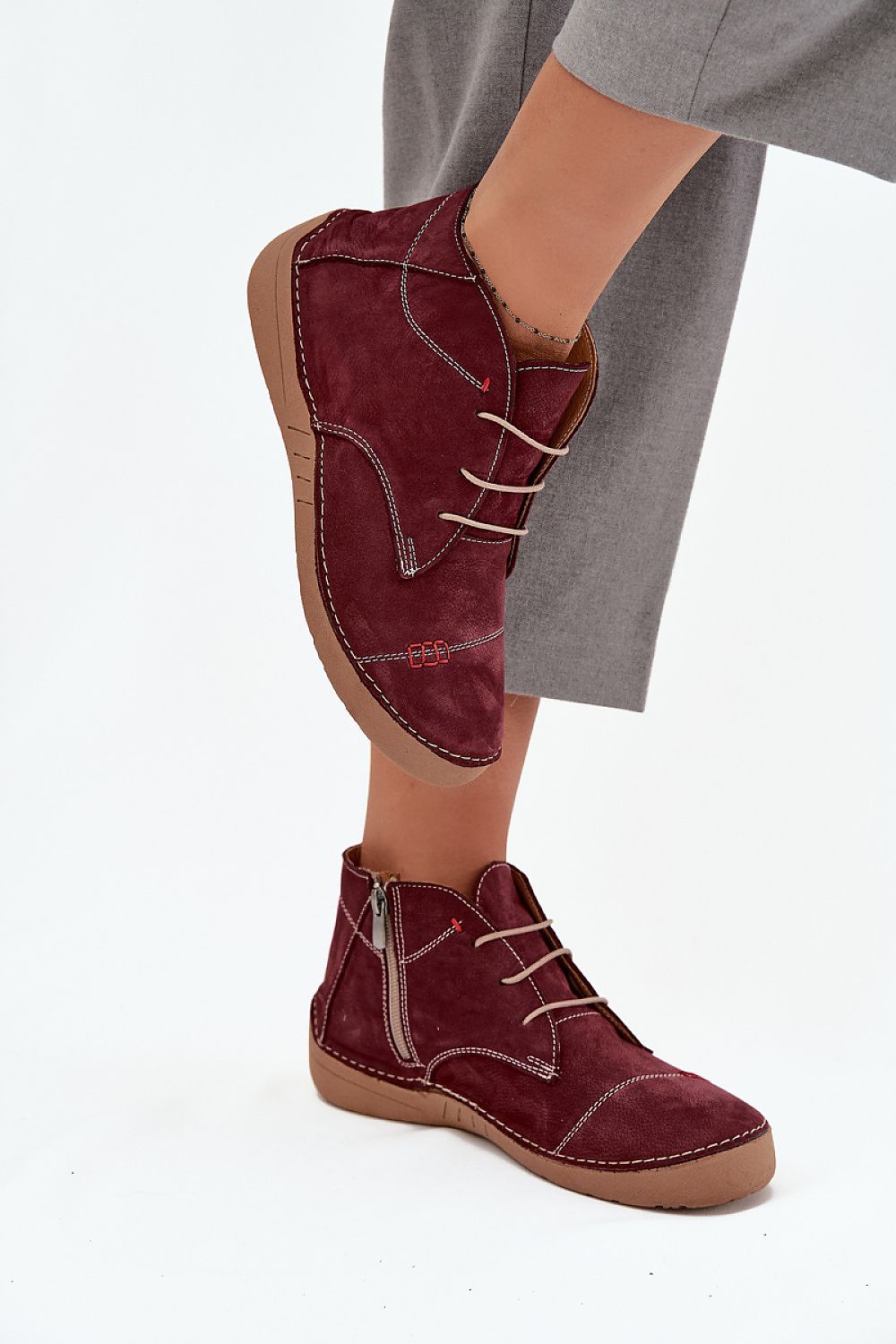 Step in Style elegant women's half shoes displayed on a neutral background, highlighting the combination of practicality and chic design with both zipper and laces.