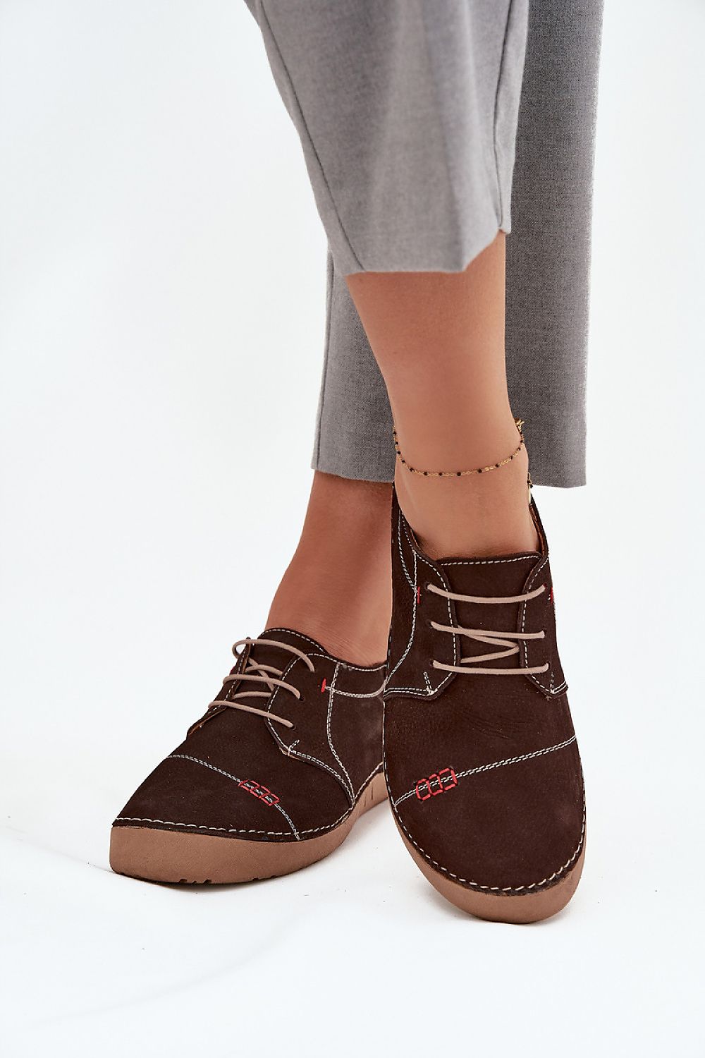 Close-up of Step In Style's sleek natural leather half shoes for women, highlighting premium craftsmanship and comfort, available in sizes EU 36-41.