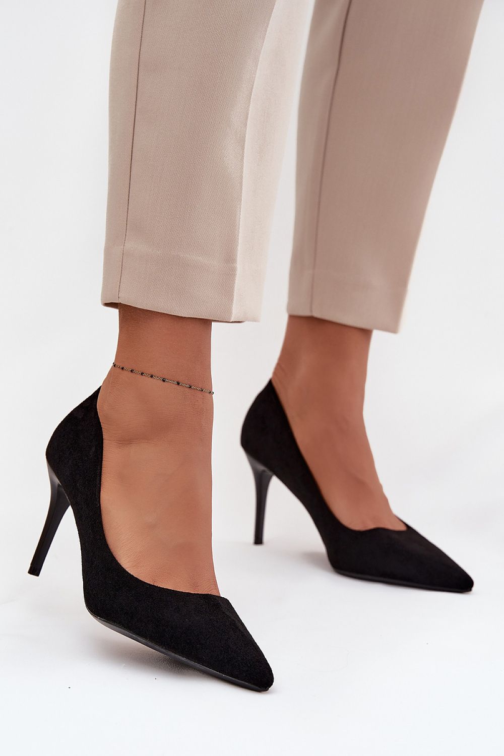 Elegant women's high heels in eco suede by Step in Style, featuring an 8.5cm heel for style and comfort, showcased against a luxurious backdrop.