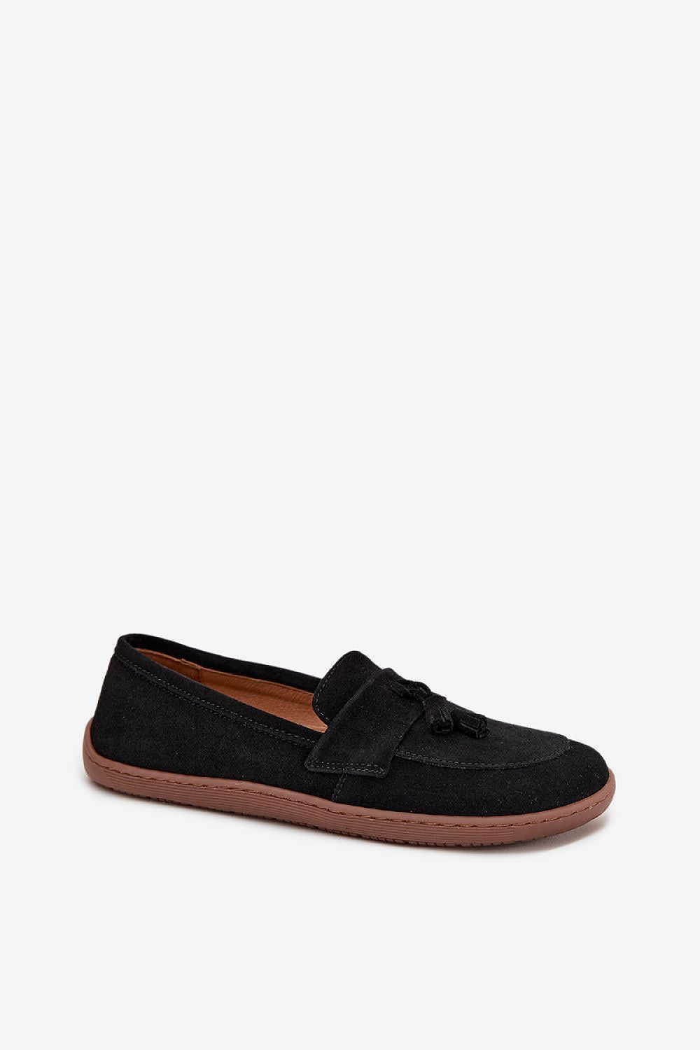 Luxury Women's suede leather moccasin slip-on shoes by Step in Style, featuring elegant tassel details, perfect for casual and elegant outfits.