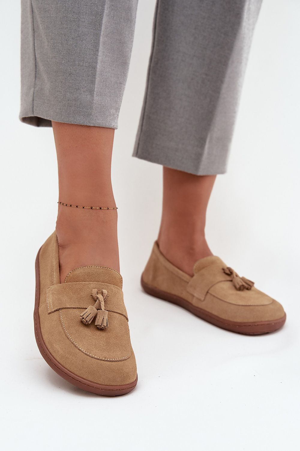 Luxurious women's suede leather moccasins with tassels, crafted by Step in Style, showcasing natural comfort and sophisticated design.