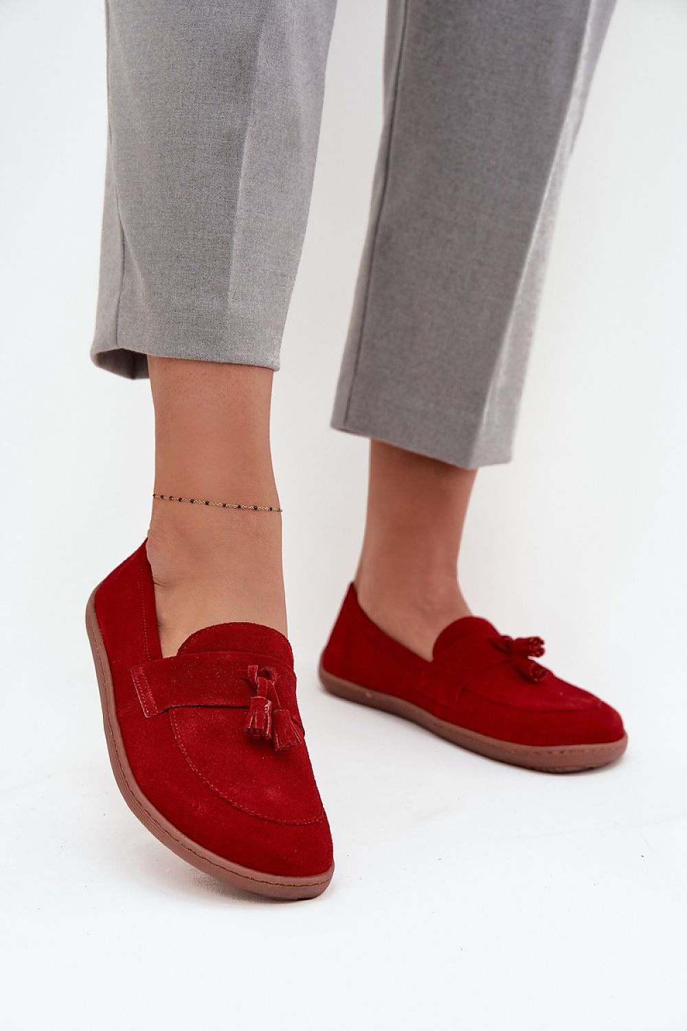 Elegant women's suede moccasins with tassels, demonstrating luxurious natural comfort and style by Step in style.