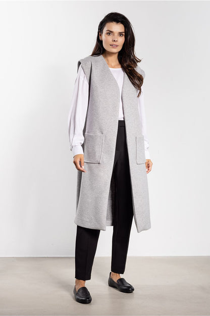 Soft fleece gilet vest for women in elegant design by Awama, showcasing practical pockets and a trendy belt.