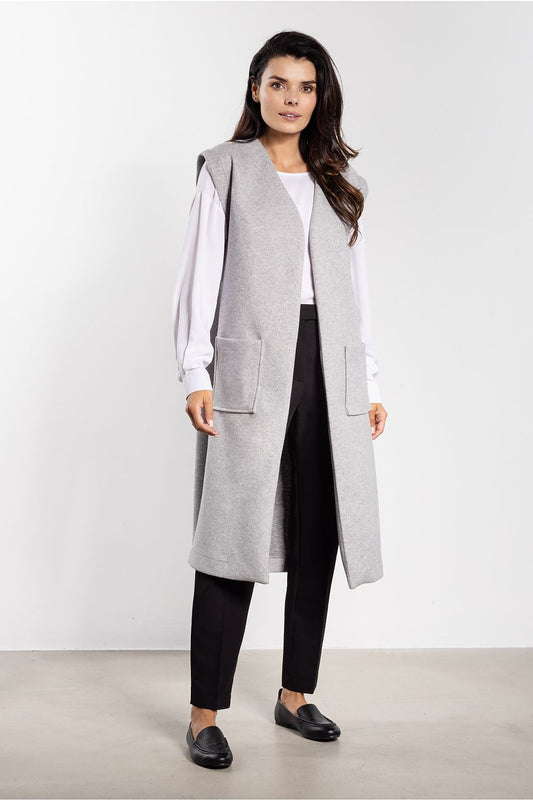 Soft fleece gilet vest for women in elegant design by Awama, showcasing practical pockets and a trendy belt.