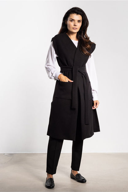Elegant long women's fleece vest by awama, showcasing a minimalist design, perfect for autumn layering with a stylish belt and functional pockets.
