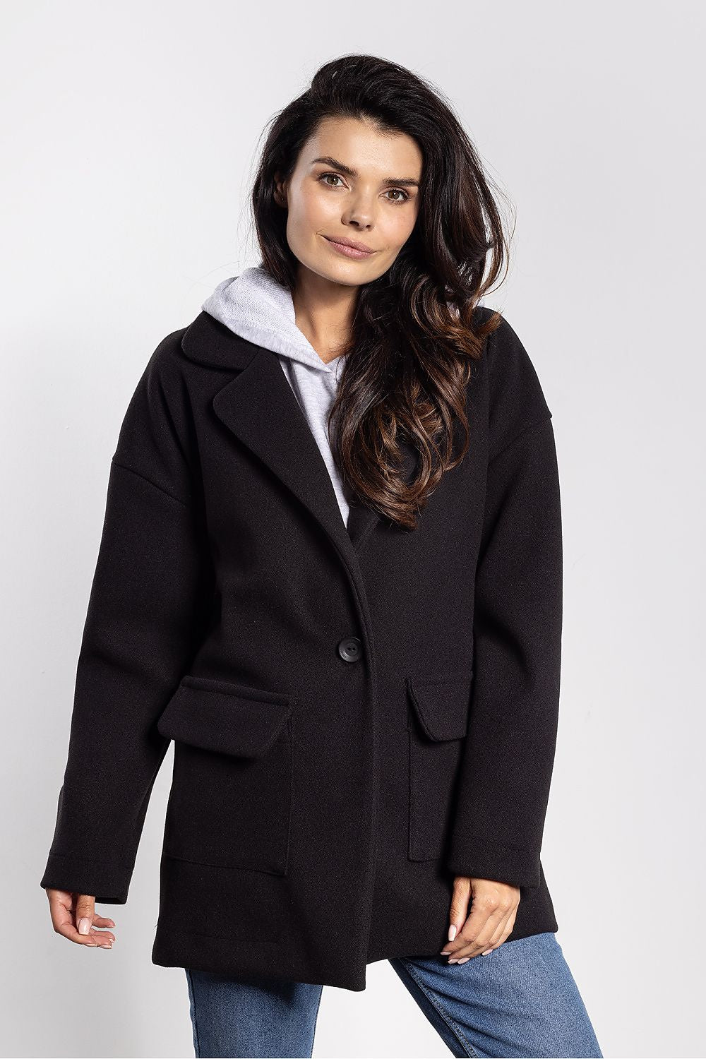 Stylish oversized women's jacket by awama showcasing a chic button fastening and a fashionable dropped shoulder line for a contemporary look.