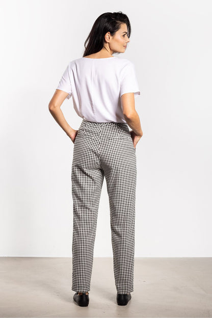 Luxury women's cigarette trousers in a timeless plaid design by Awama, showcasing a comfortable fit and elegant silhouette ideal for versatile styling.