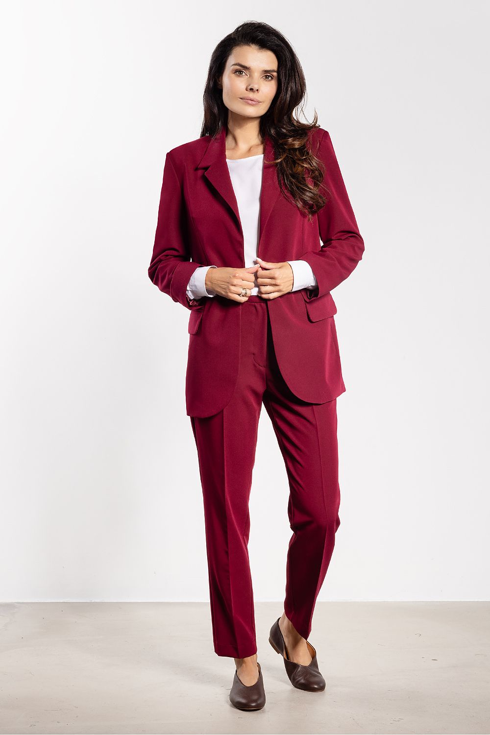 Stylish close-up of Awama's women's classic blazer showcasing the luxurious fabric, classic lapels, and sleek silhouette ideal for sophisticated outfits.