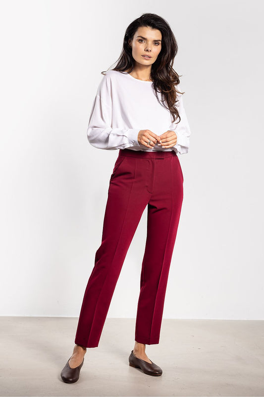 Elegant women's cigarette pants by Awama, featuring a high waist and ankle length, perfect for a timeless office style.