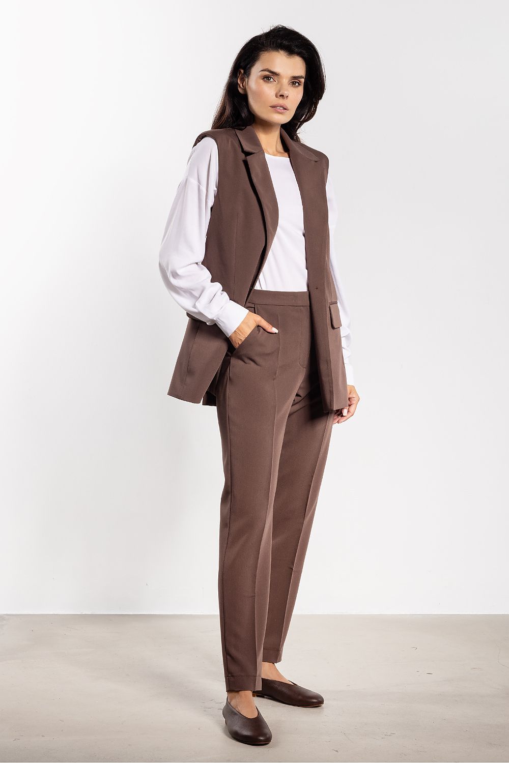 Chic Awama women's gilet vest in sophisticated design, featuring single-button closure and lapels, ideal for an elegant silhouette.