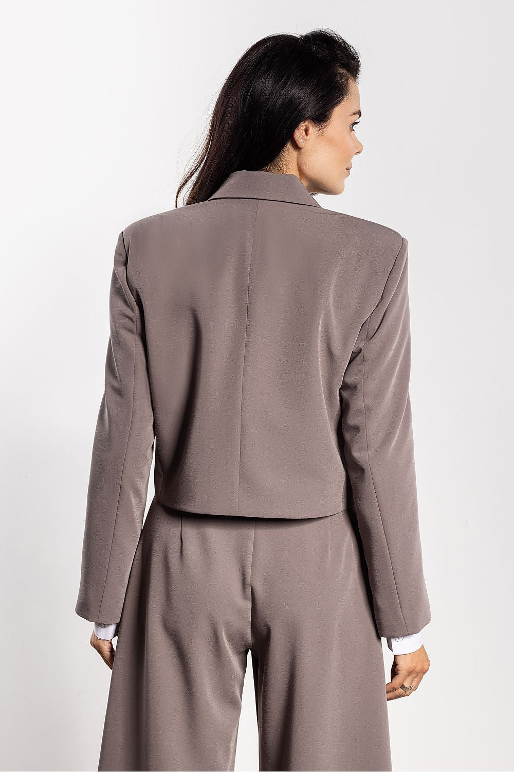 Stylish loose cut jacket by Awama, featuring classic lapels for a timeless look, ideal for various occasions.
