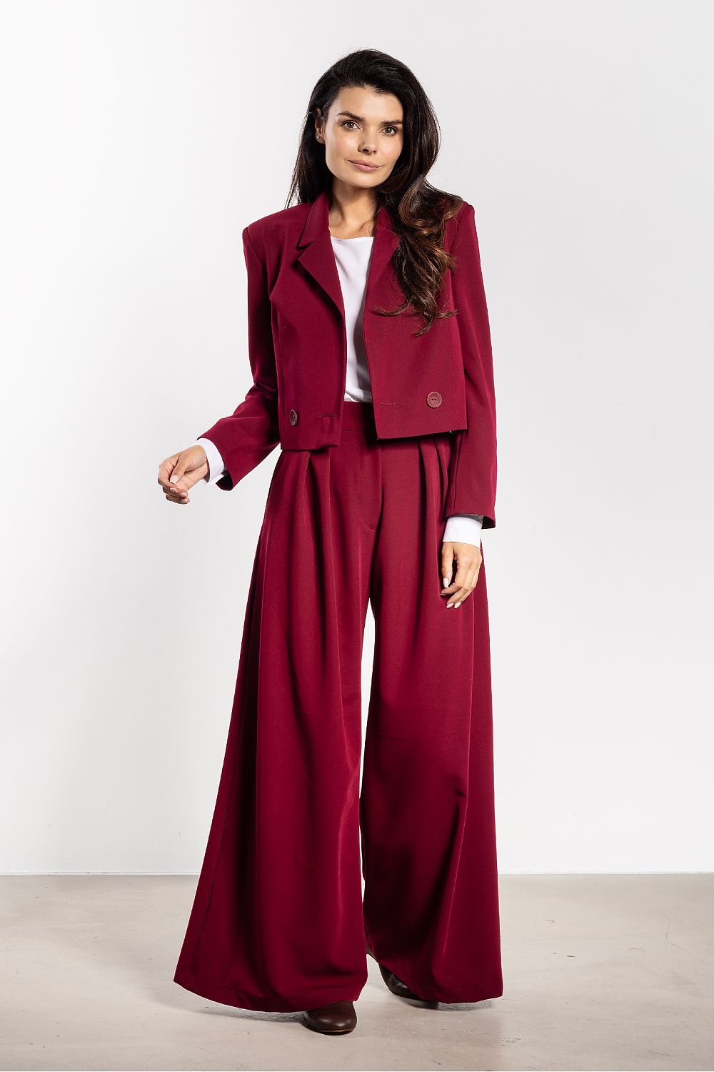 Awama's elegant double-breasted jacket, showcasing its refined craftsmanship and versatility for both professional and casual outfits.