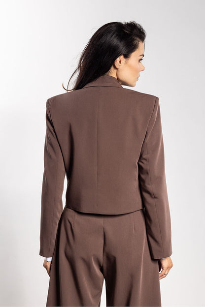 Stylish loose cut of the Awama double-breasted jacket, demonstrating versatility and elegance, ideal for dressing up or down.