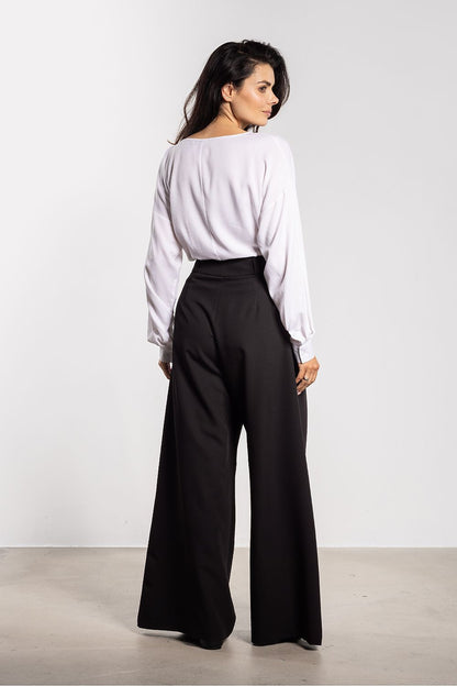 Luxury women's wide-leg trousers in classic black by Awama, perfect for versatile styling from day to night with their fashionable high waist and elegant flares.