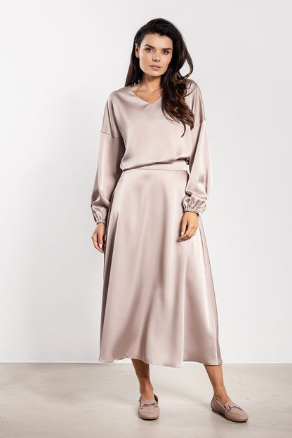 Stunning Awama satin midi skirt featuring a classic flared design, perfect for enhancing any elegant wardrobe collection.