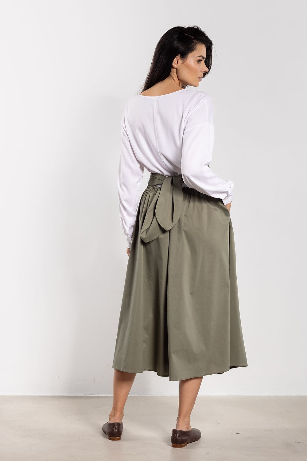 Sophisticated midi skirt with a flattering high waist and flared design, exclusively from Awama, ideal for chic ensembles.
