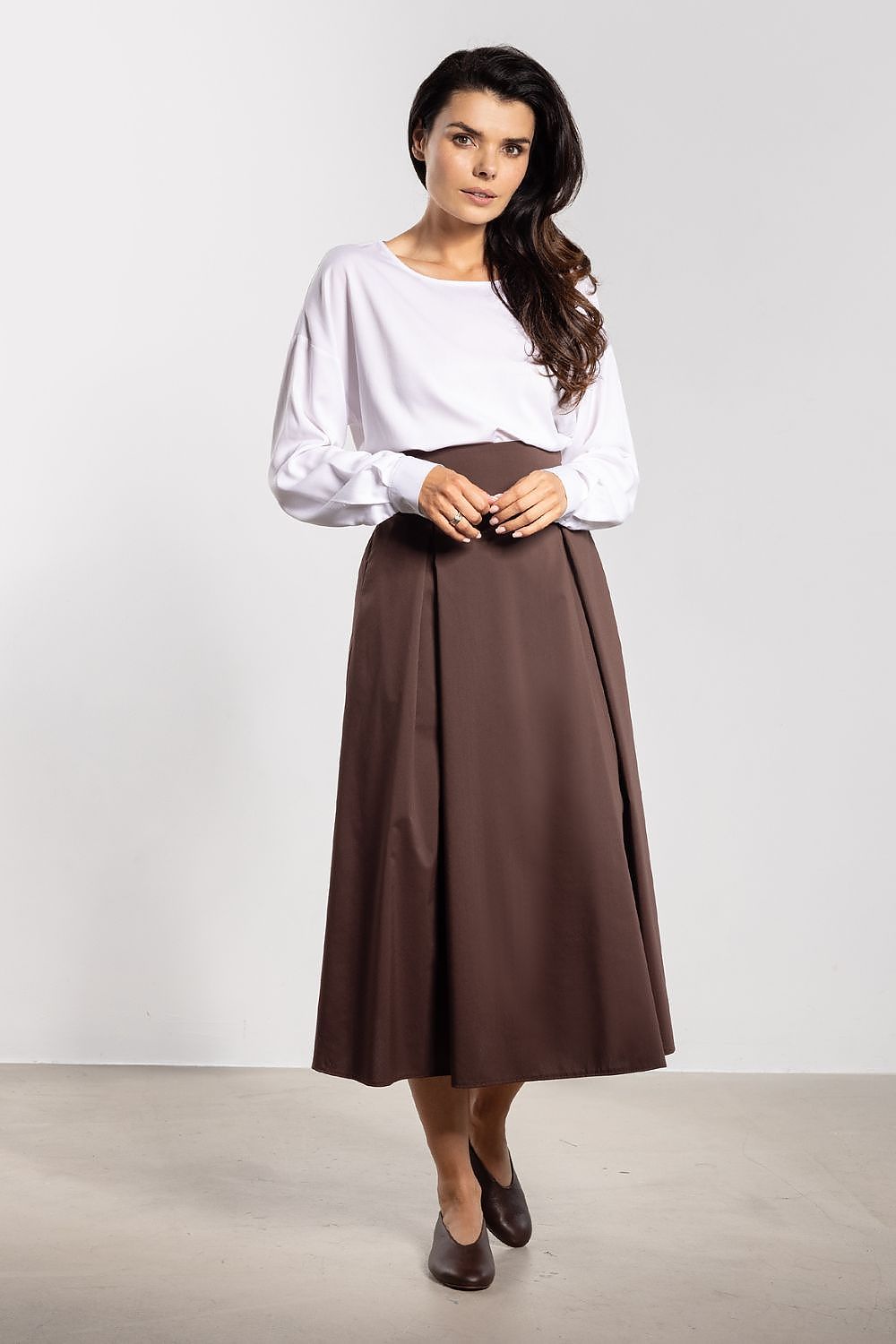 Chic and versatile high waist midi skirt with flared bottom by Awama, designed to elevate any wardrobe for sizes S to XL.