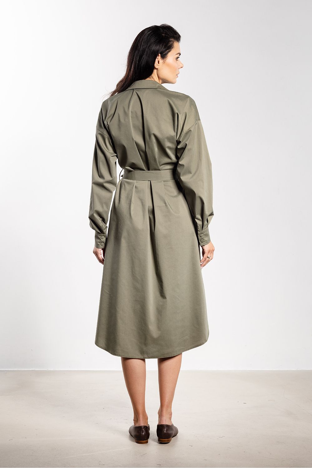 Luxurious belted midi shirt dress by Awama showcasing long sleeves and an elegant silhouette, suitable for work and special occasions.