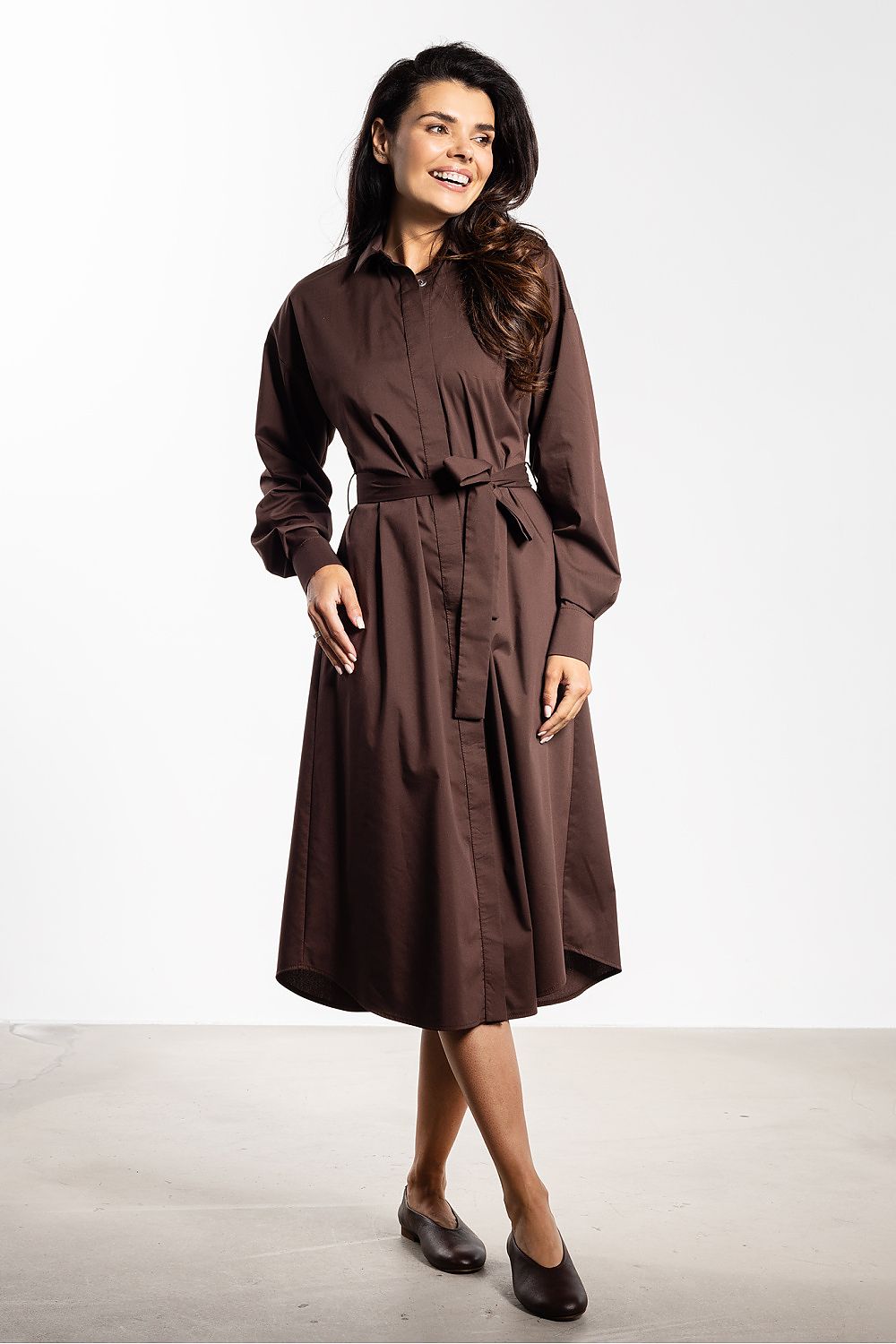 Stylish Awama midi shirt dress with a refined knee-length design and sophisticated button detail, ideal for a chic wardrobe.